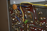 CLoseup of the knarly transistor / capacitor hookup - Note: this is possibly in contact with the bottom cover of the unit when closed. Considering putting a non-conducting barrier film there.